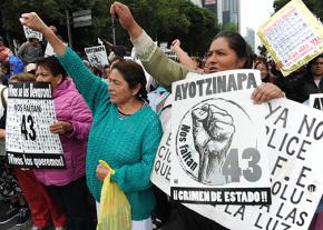 Protesters gather to demonstrate on the one-year anniversary of the disappearance of 43 students